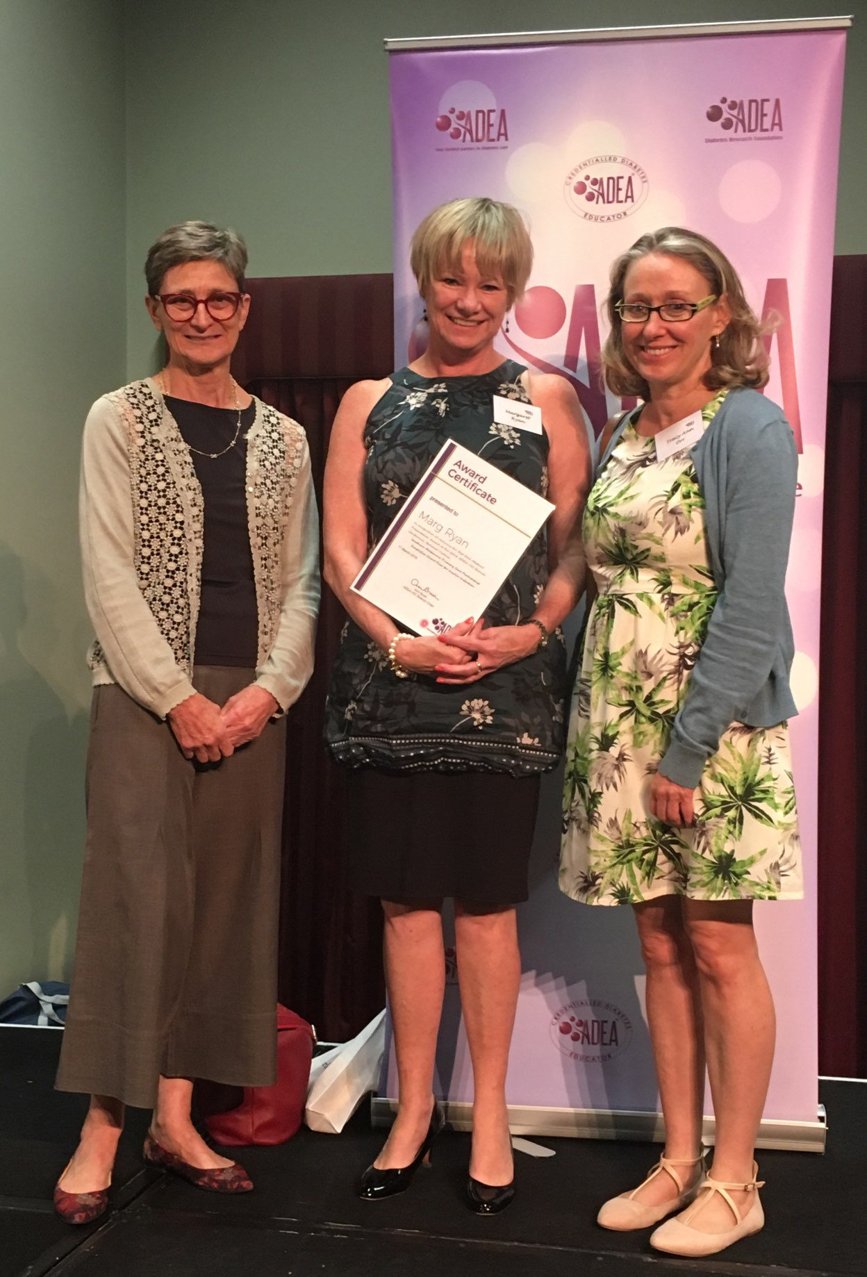 Image shows Joanne Ramadge, Marg Ryan and Tracy Orr with certificate