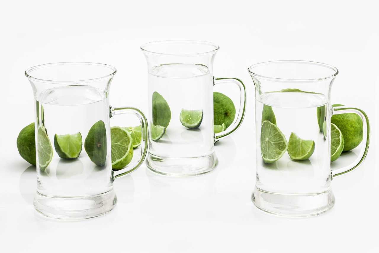 three glasses of water with lime